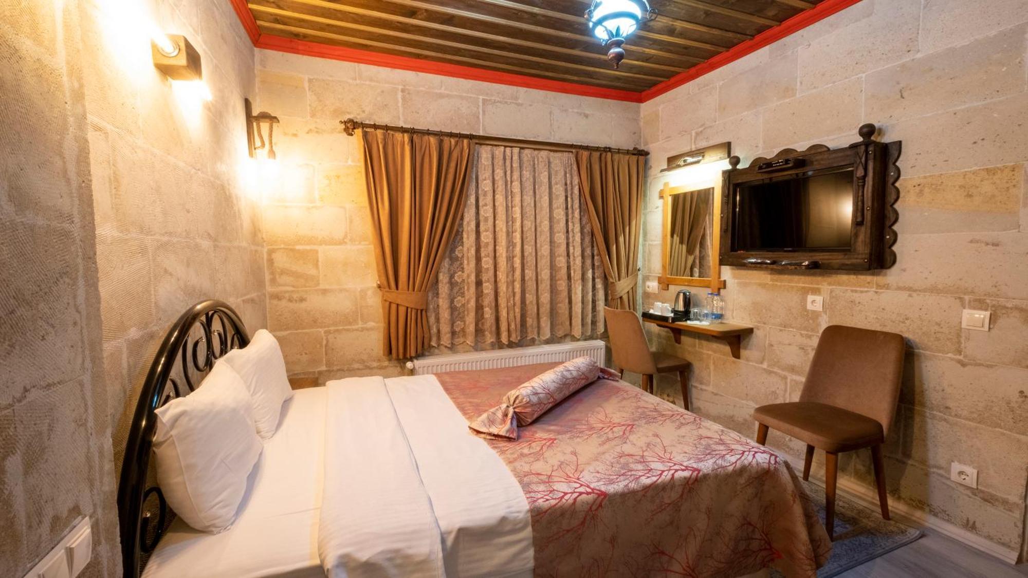 In Stone House Hotel Гьореме Стая снимка