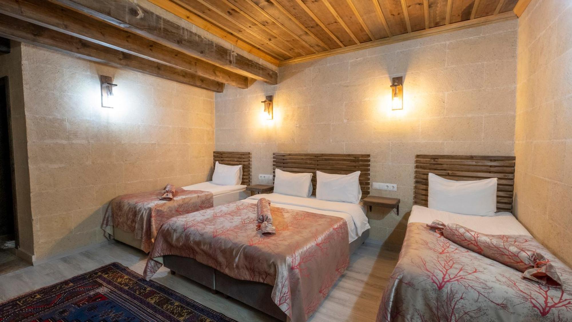 In Stone House Hotel Гьореме Стая снимка
