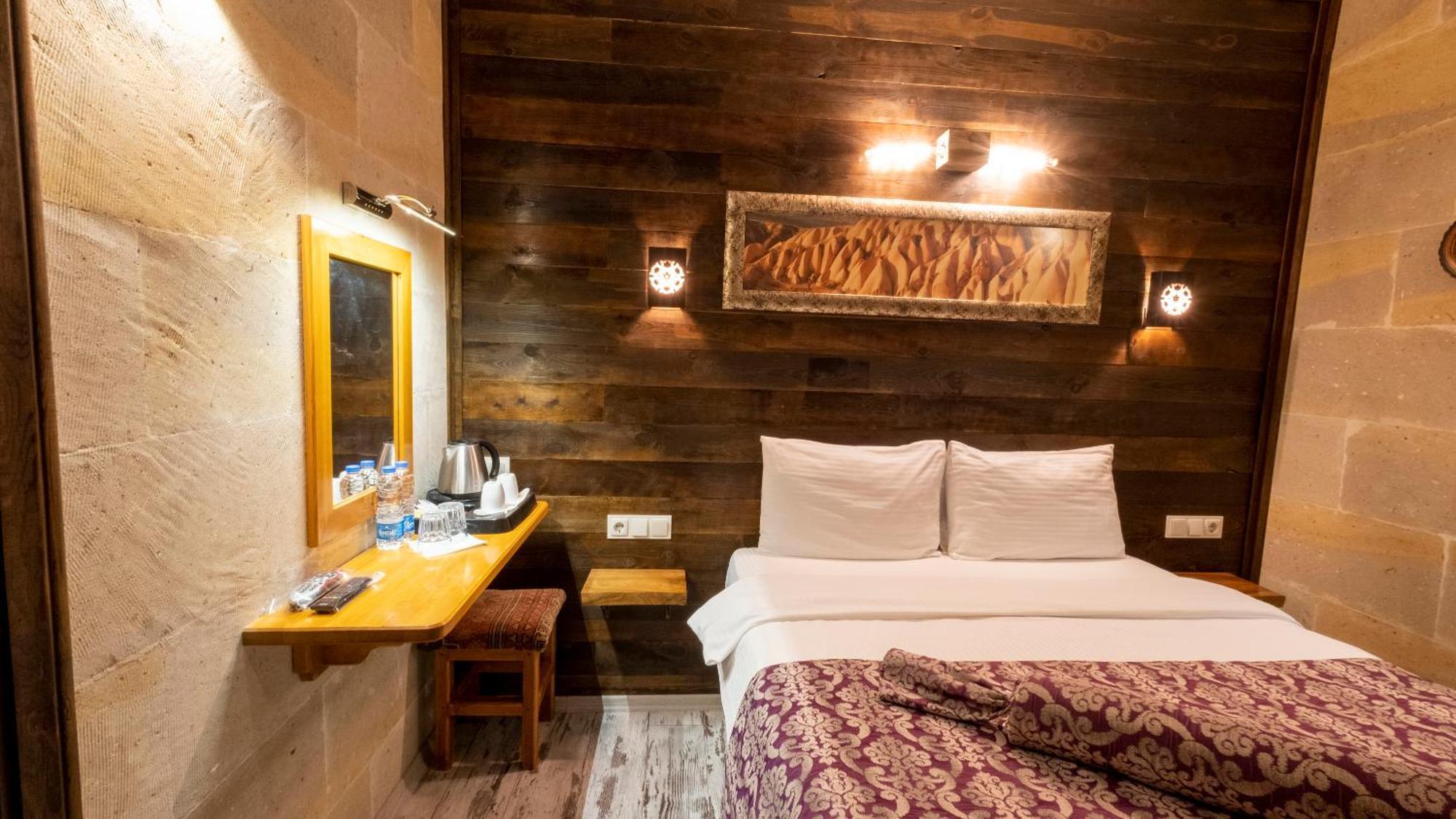 In Stone House Hotel Гьореме Стая снимка