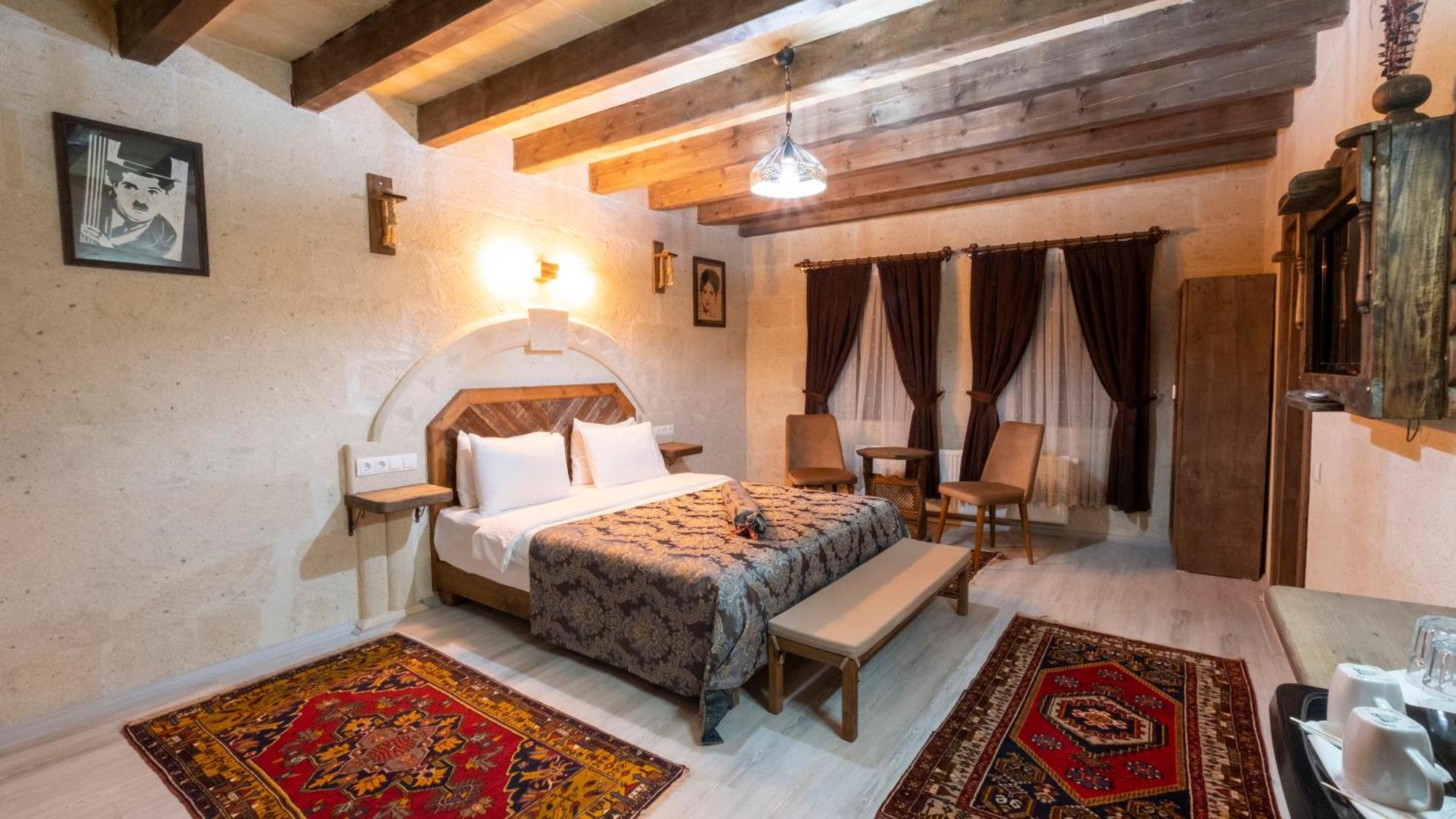 In Stone House Hotel Гьореме Стая снимка
