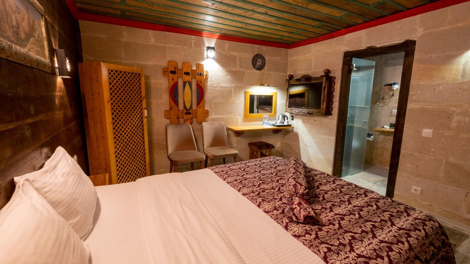 In Stone House Hotel Гьореме Стая снимка