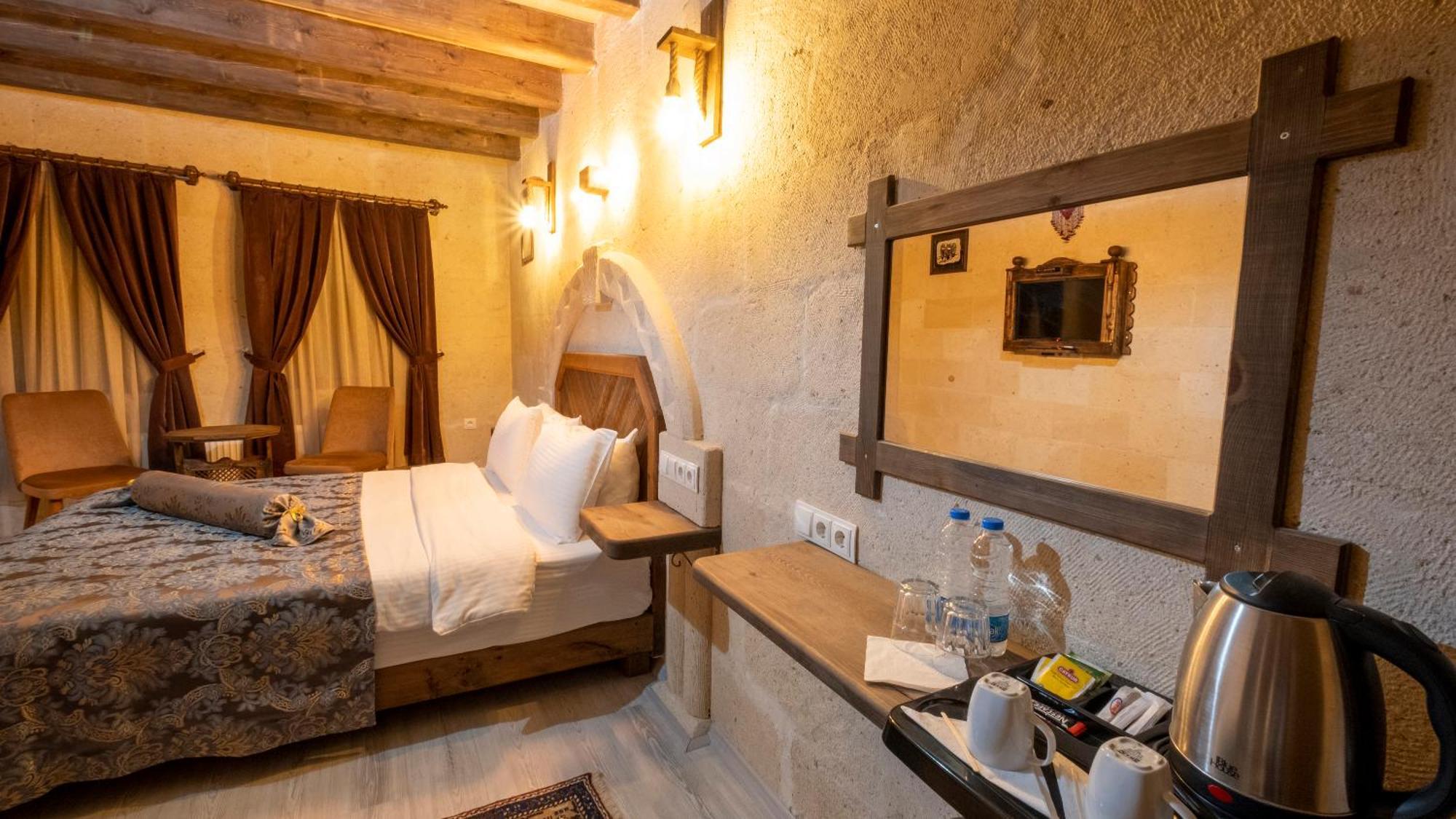 In Stone House Hotel Гьореме Стая снимка