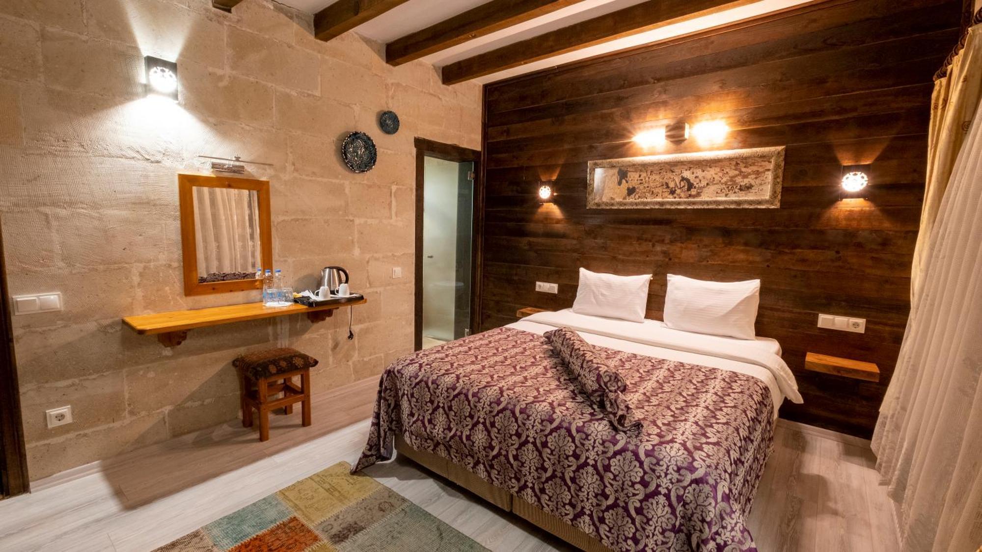 In Stone House Hotel Гьореме Стая снимка